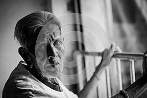 The old woman`s felling lonely. ,she`s senior woman in family and the elderly