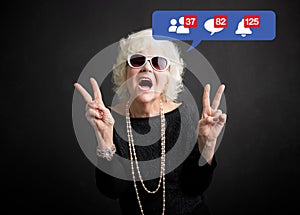 Old woman still rocking and being active on social media