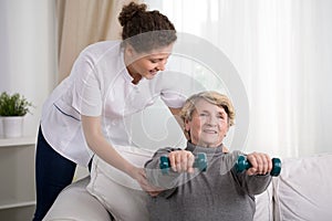 Old woman training at home photo