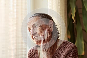 Old woman wearing surgical mask