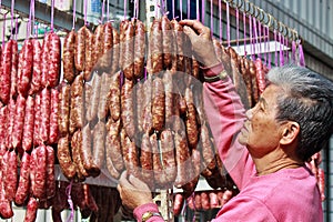 Old woman who Making sausage