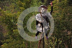 Old woman witch figurine and haunted house cafe coffee shop in garden outdoor on forest mountain at pai city hill valley in Mae