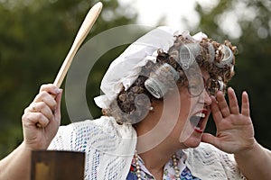 Old Women shouting over the garden fence