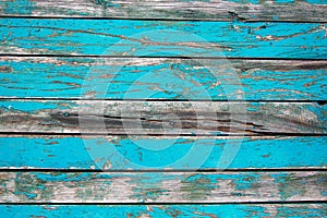 Old wood background. rustic weathered barn wooden background with knots and holes for nails, traces of remains of old paint on