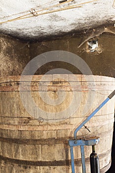 Old wood barrel in wine cellar