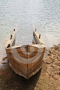 Old wood boat sank on bank photo