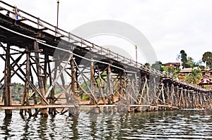 Old wood bridge and cloudy