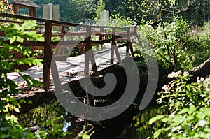 An old wood bridge through the river