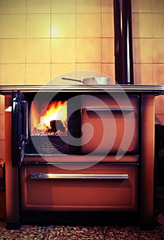 Old wood-burning stove in the kitchen with vintage effect