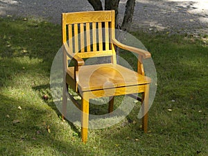 Old wood chair on the grass