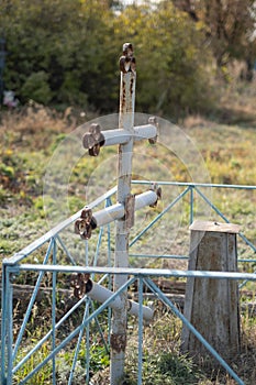 Old wood cross at cemetery