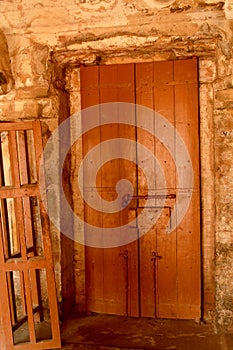 A old wood door in the ancient Brihadisvara Temple in Thanjavur, india.