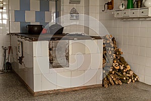 An old wood-fired kitchen in a country house. A place to prepare meals in an old house