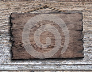 Old wood plank or plate hanging on timber plank