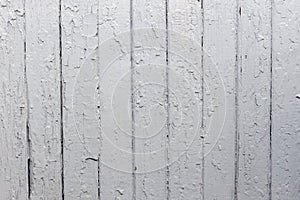 Old wood plank wall background painted with grey colour weathered with natural patterns