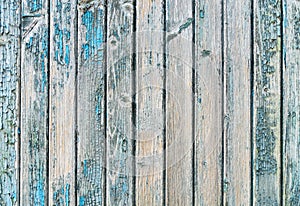 Old wood planks with paint peeling off.