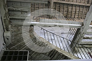 Old wood stair in abandoned factory.