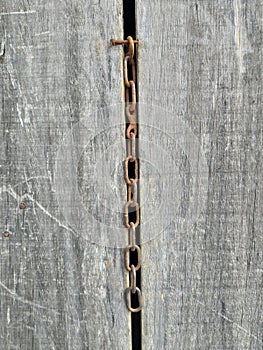 Old wood texture. Wood texture and chain. Rustic wood texture.