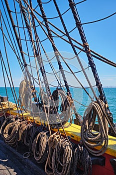 Old wooden Age of sail sailing ship ropes cordage. and shroud