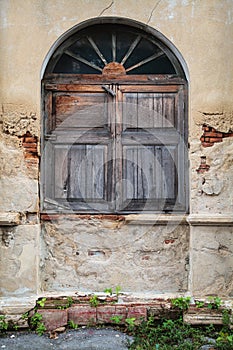 Old wooden arc window