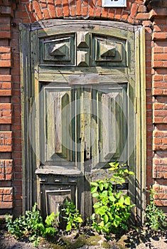 Old wooden arch door