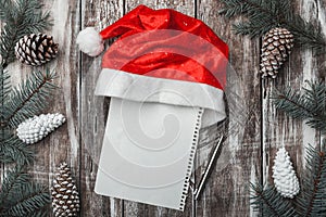 Old wooden background. Fir branches, cones. Christmas Fellowship, New Year and Xmas. Letter with message space for Santa. photo