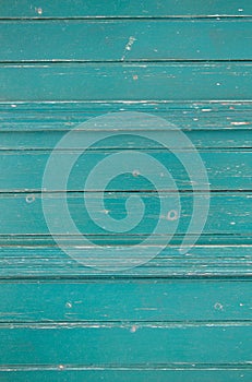 Old wooden background in green or turquoise color.