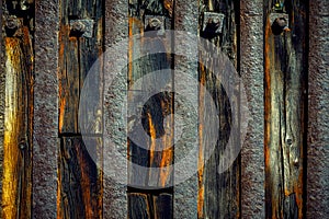 Old wooden background with rusty steel plates