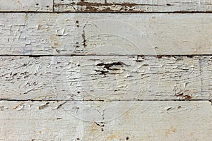 Old wooden background of white shabby painted wooden planks. Background of old painted texture wood as a basis for vintage