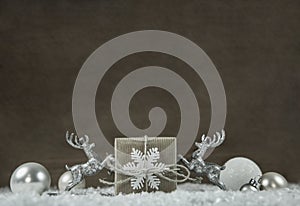 Old wooden background with white and silver grey christmas decor