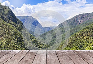 Old wooden balcony terrace floor on viewpoint high tropical mountain of rainforest