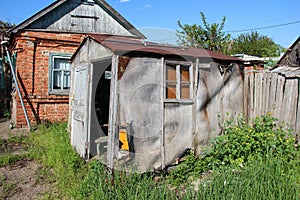 Old wooden barn with different tools