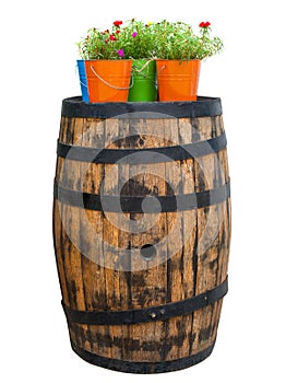 Old wooden barrel with flowers on top