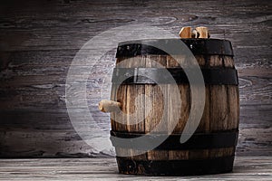 Old wooden barrel standing on table