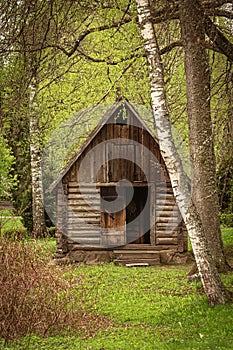 Old wooden bathhouse in rural area