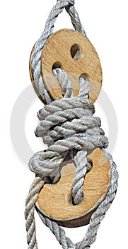 Old wooden block with rope