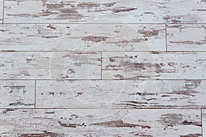 Old wooden board. Wooden wall with a shabby old paint. Fence. Wood texture. Cross section of the tree. Background