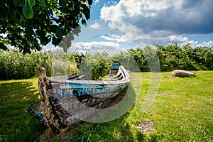 Old wooden boat ashore