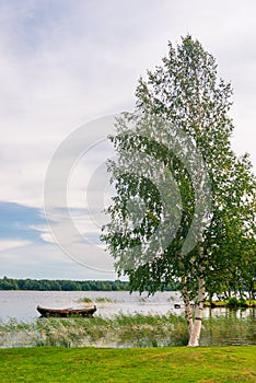 Old wooden boat in a small picturesque bay