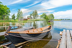 Old wooden boat in a small picturesque bay
