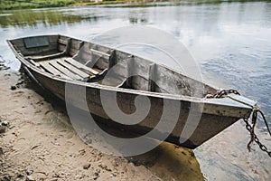 Old wooden boat on the water