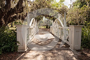 Old wooden bridge along the riverway at historic Koreshan State Park