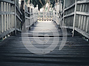 Old wooden bridge path to dead end