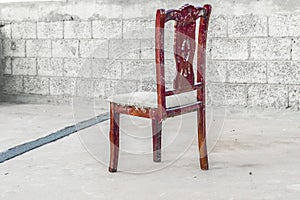 An old wooden broken chair