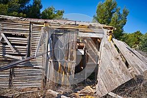 Old wooden cabin house destroyed by hurricane