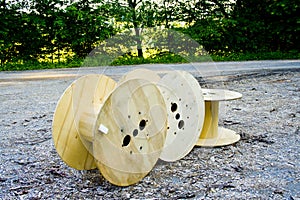 Old wooden cable bobbin discarded in a forest in bavaria, germany