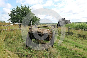 Old wooden cart in the abandoned village