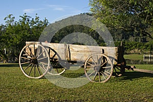 An old wooden cart on a fazenda in Brazil. Wooden cart photo