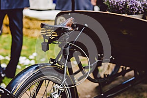 Old wooden cart to transport goods used for decoration at a wedding