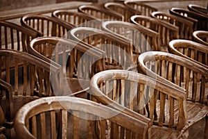 Old wooden chairs in the theater